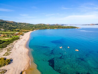 Aerial view of Mannena beach in Cannigione, Costa Smeralda, Sardinia, Italy